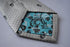 silver grey skulls design tie